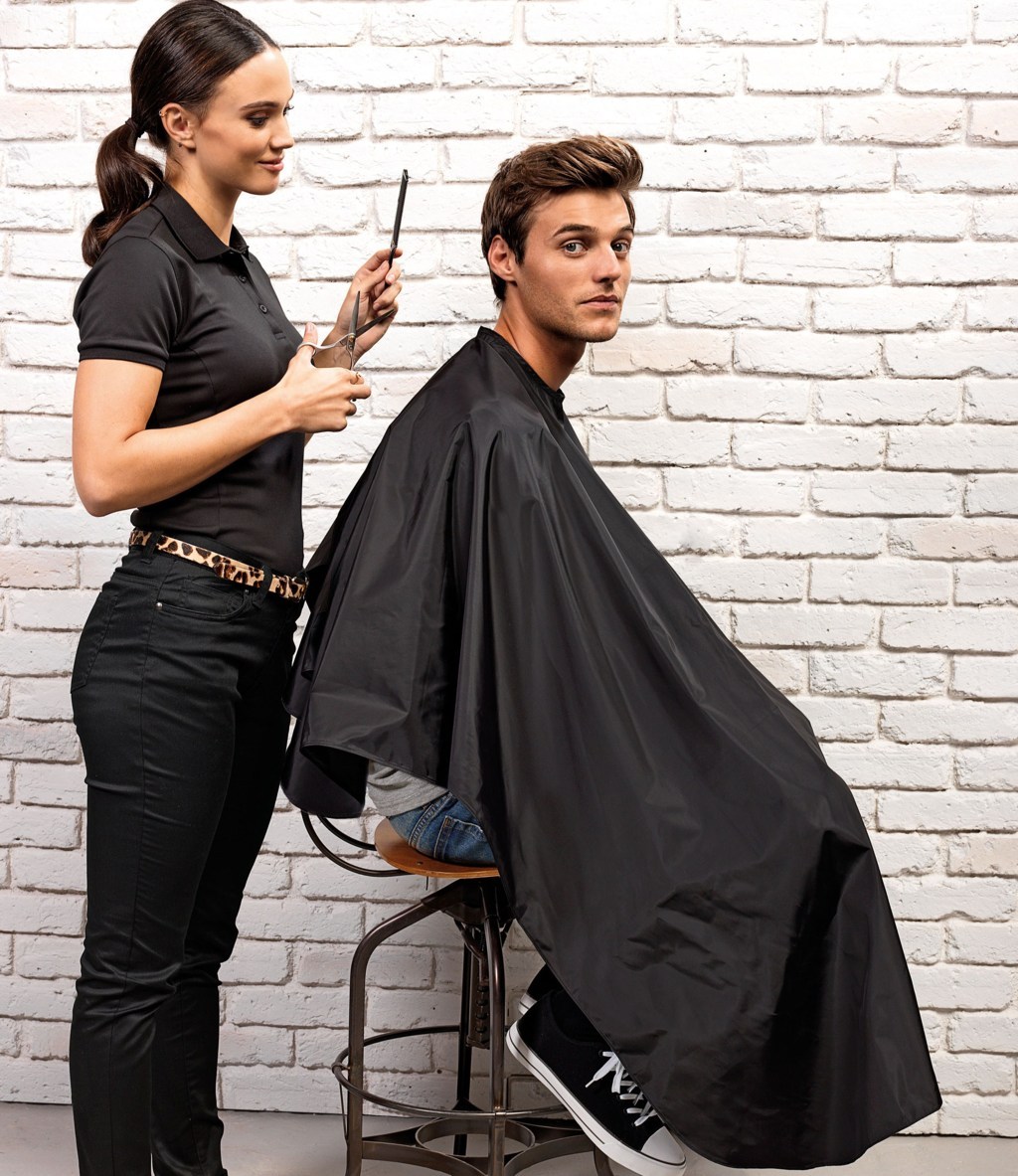 Tablier pour coiffeur et barbier en tissu imperméable.